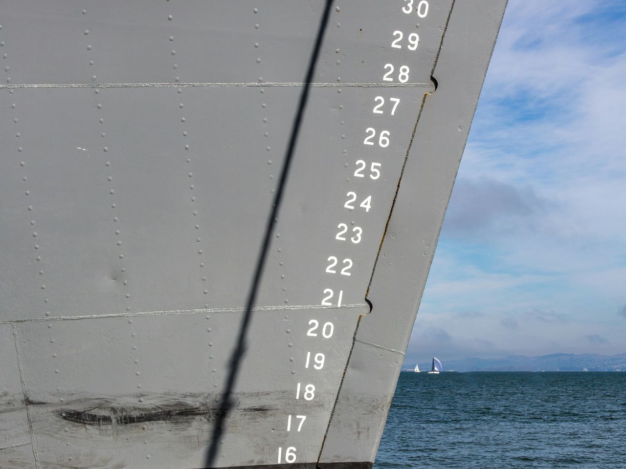 Draft marks and plating on the side of a ship